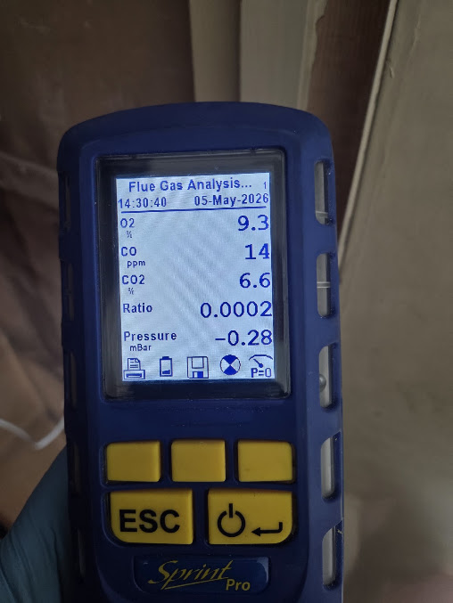 Flue gas analyser being used during boiler testing